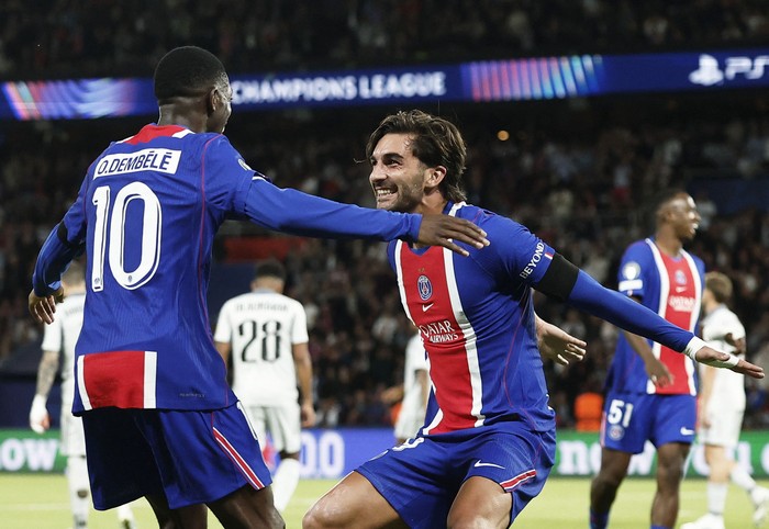 Soccer Football - UEFA Champions League - Paris St Germain v Slovan Bratislava - Parc des Princes, Paris, France - September 9, 2026 Paris St Germains Ferran Torres celebrates scoring their fifth goal with Ousmane Dembele REUTERS/Benoit Tessier