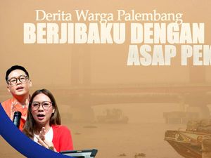 Derita Warga Palembang Berjibaku dengan Asap Pekat