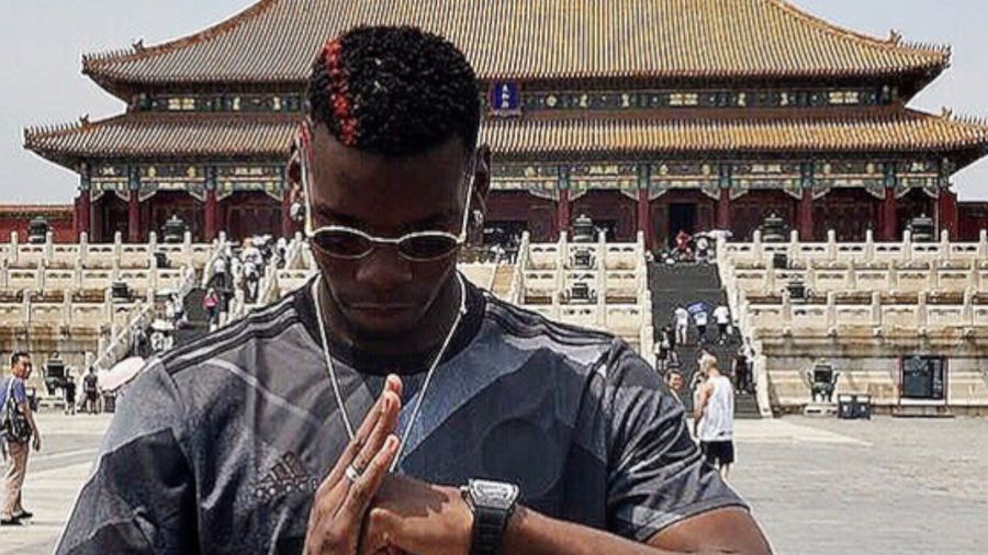 Begini Gaya Paul Pogba Liburan di China