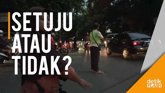 Melihat Lagi Aksi Pak Ogah yang Mau Direkrut Polisi