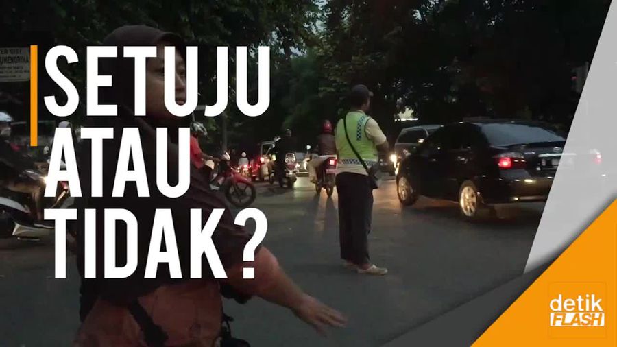 Melihat Lagi Aksi Pak Ogah yang Mau Direkrut Polisi