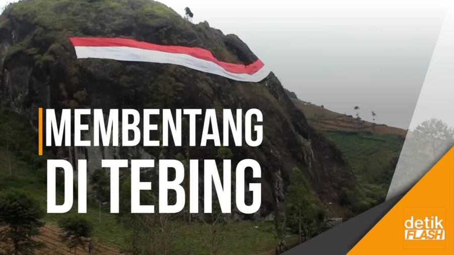 Ratusan Pecinta Alam di Garut Bentangkan Merah Putih di Tebing