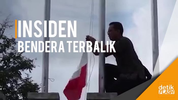 Aksi Keren Guru Panjat Tiang, Betulkan Bendera Terbalik