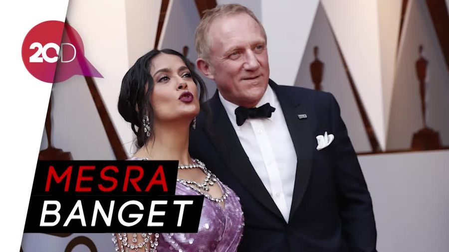 Smooch! Gaya Pasangan Selebriti di Red Carpet Oscar 2018