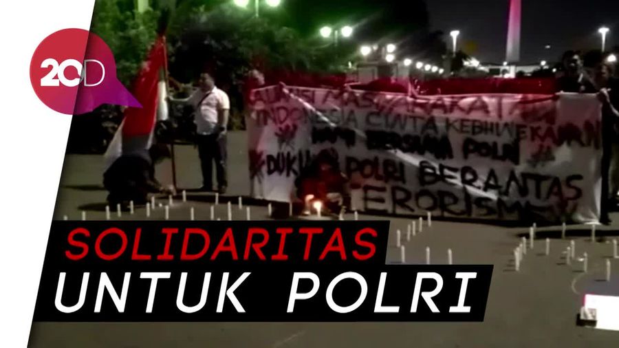 Aksi Nyalakan 1.000 Lilin Dukung Polri