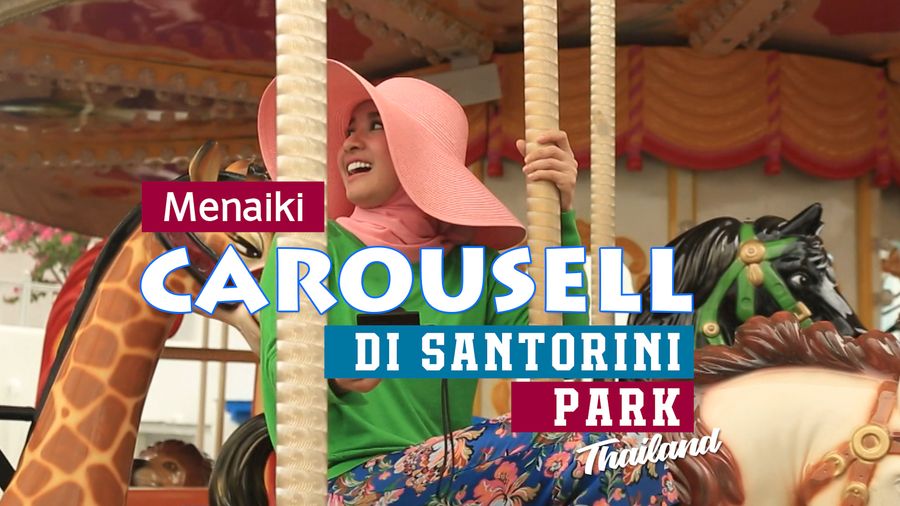 Menaiki Carousell di Santorini Park Thailand