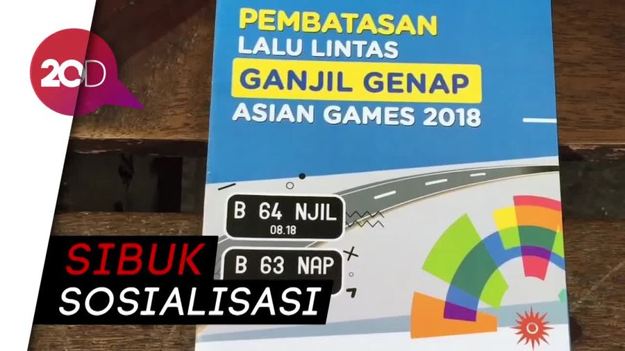 Suasana Uji Coba Ganjil-Genap di Perempatan Tomang