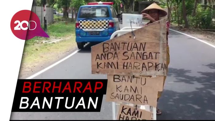 Bantuan Tak Kunjung Datang, Warga ‘Ngemis’ ke Jalanan