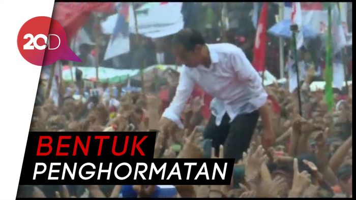 Jokowi: Rakyat Hujan-hujanan, Masak Saya Payungan?