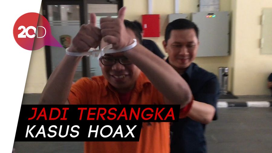Berbaju Tahanan dan Tangan Terborgol, Ini Penampakan Mustofa Nahra