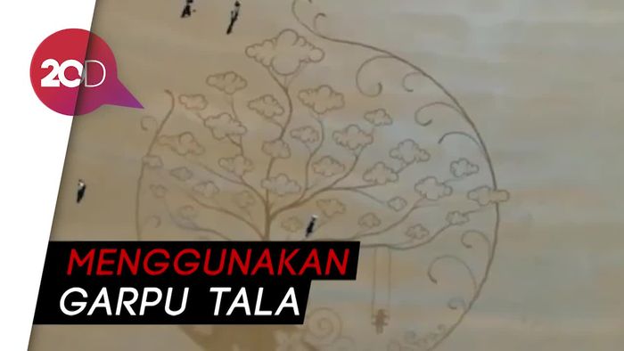 Kreatif! Seniman Asal Perancis Ini Melukis di Pasir Pantai