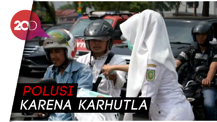 Pekanbaru Dikepung Asap, Masker Mulai Dibagikan