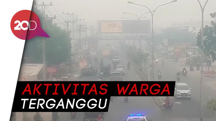 Parahnya Asap di Riau, Sampai-sampai Jalanan Gelap