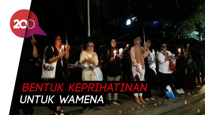 Pijar Lilin Hiasi Monas, Warga Gelar Aksi Solidaritas untuk Wamena