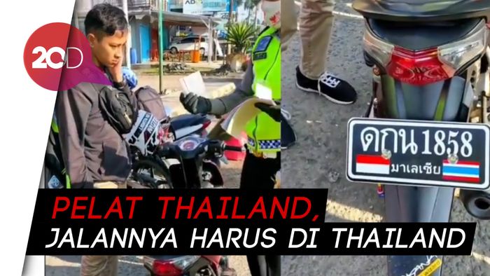 Polisi Tilang Pemotor Pakai Pelat Beraksara Thailand 