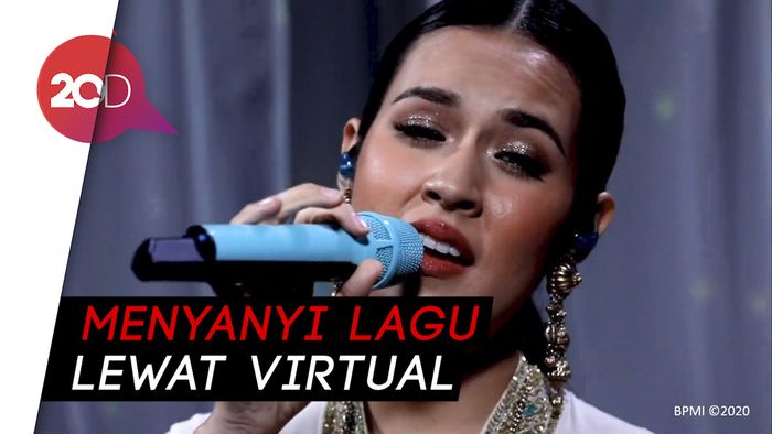 Penampilan Raisa Jelang Pengibaran Bendera di Istana Negara