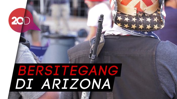 Pendukung Trump-Biden Berhadapan, Ada Yang Bawa Senjata