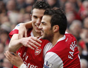 Van Persie, Fabregas. (AFP)