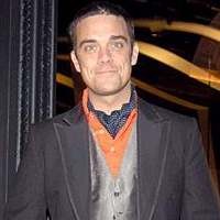 Robbie Williams Penasaran Rasanya Orgasme