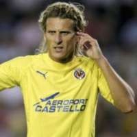 Forlan Peringatkan The Gunners  