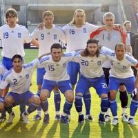 Rehhagel Pertahankan Skuad Juara