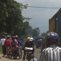 Motor Trail TNI Terbakar di Jalan Parung Bogor