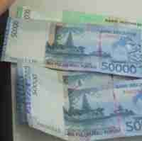 Rupiah Terlontar ke 9.895/US$
