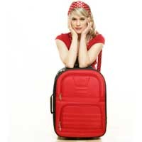 Kurangi Berat Koper Saat Liburan