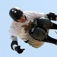 Woods & Federer Dikalahkan Burnquist