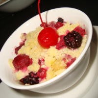 Mixed Berries Cobbler with Vanilla Sauce
