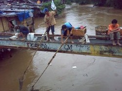 Volume Air Sungai Ciliwung Capai Puncak 