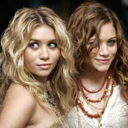 Kembar Olsen Rancang Busana Pria