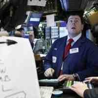 Bernanke Tenangkan Wall Street