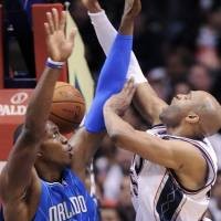 Nets Buyarkan Ambisi Magic