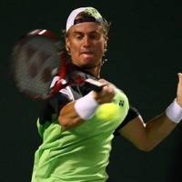 Hewitt & Wozniacki Sukses di Tanah Liat