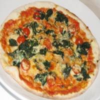 Wheat Flower Pizza with Spinach and Cherry Tomatoes