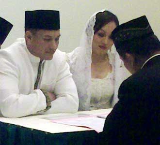 Pernikahan Adjie-Angie