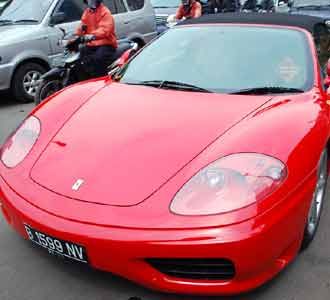 Ferrari Merah Meriam Belina