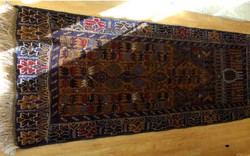 Menggunting Sajadah