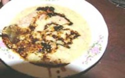 Nikmatnya Bubur Syurbah Dipadu Teh Naknak
