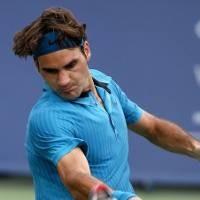 Si Kembar Tak Hambat Federer