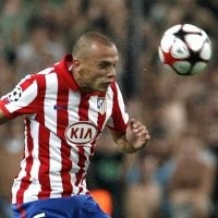 Heitinga Akhirnya ke Everton