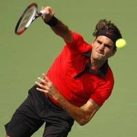 Federer dan Soderling Melaju