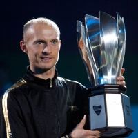 Tundukkan Nadal, Davydenko Juara