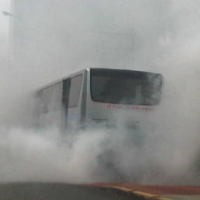 Busway Diselimuti Asap di Kuningan, Penumpang Panik