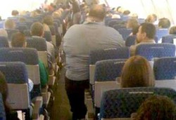 Repotnya Penderita Obesitas di Pesawat