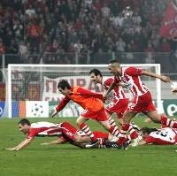 Tekuk Arsenal, Olympiakos Lolos