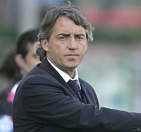 Hughes Dipecat, Mancini Latih City 
