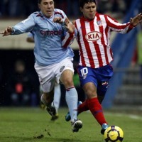 Atletico Tertahan, Racing Menang