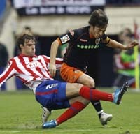 Ditekuk Atletico, Valencia Kian Jauhi Barca-Madrid